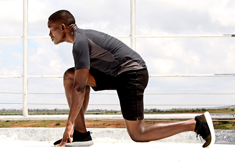 Focused Athlete is Ready to Run Outdoors on Sunny Day - High Quality ... Focused Athlete is Ready to Run Outdoors on Sunny Day - High Quality ...